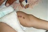 تصویر شکنجه طفل شیرخوار در دخمه معتادان +تصاویر