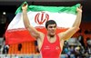 تصویر مدال شیرین طلای دنیا برای امیر ایران/ علی اکبری اولین قهرمان ایران در سنگین وزن کشتی فرنگی